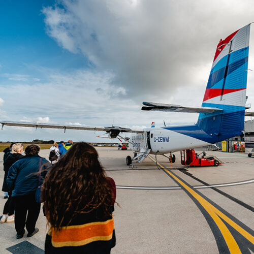 Passengers boarding a Skybus twin otter