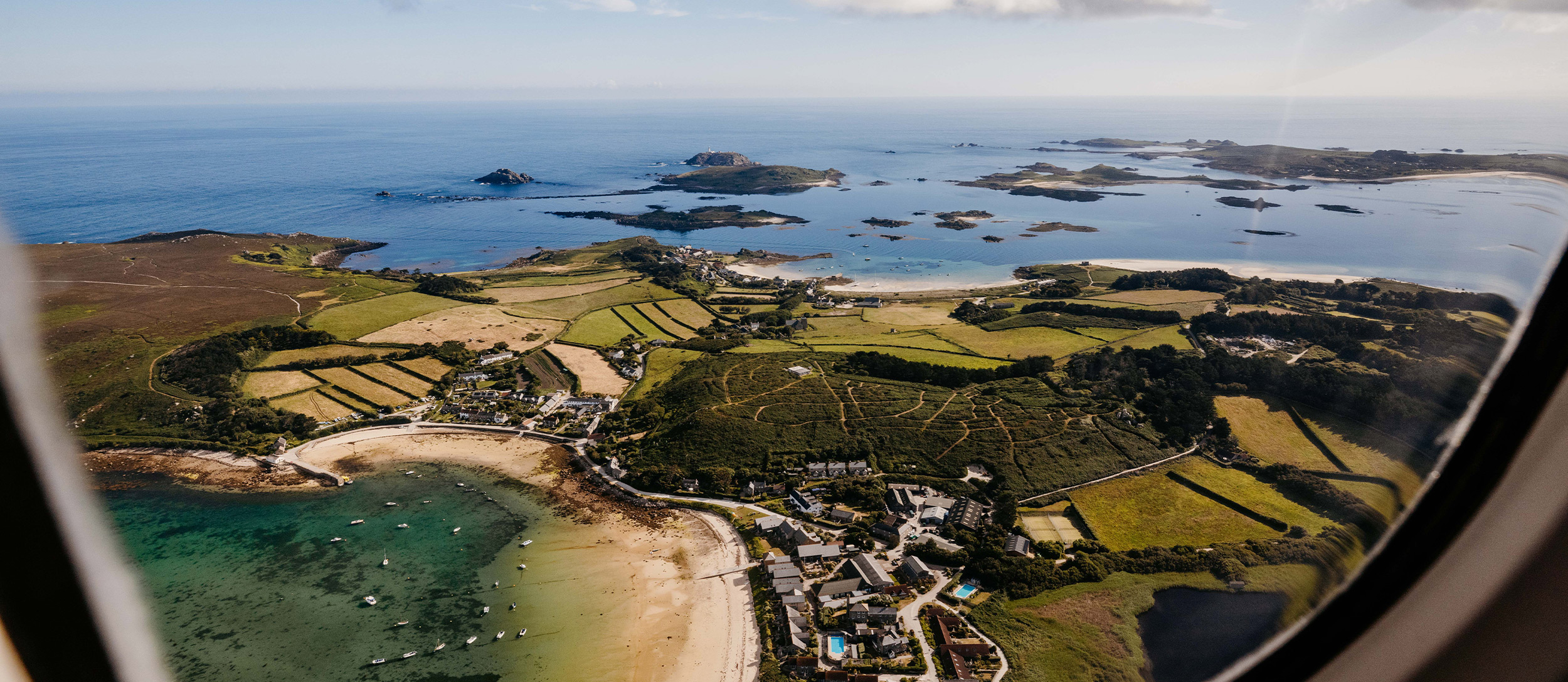 view of the isles of scilly from a Skybus twin otter aircraft - summer 2024