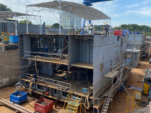 Menawethan, in the foreground, and Scillonian IV, in the background, under construction alongside each other in the building dock in Vietnam