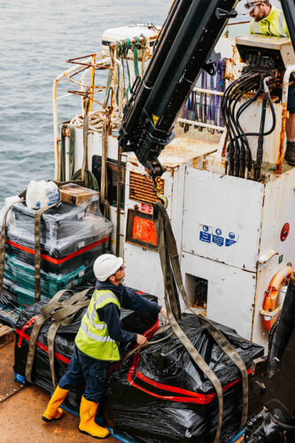 Isles of Scilly Freight employees loading Lyonesse Lady