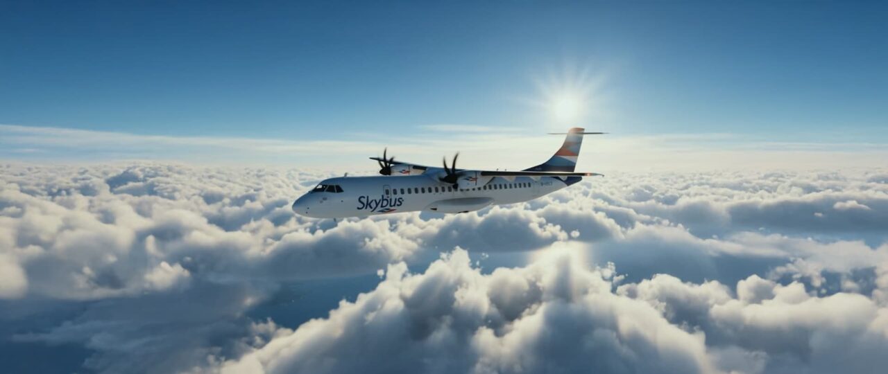 CGI- Skybus ATR 72 aircraft flying above the clouds