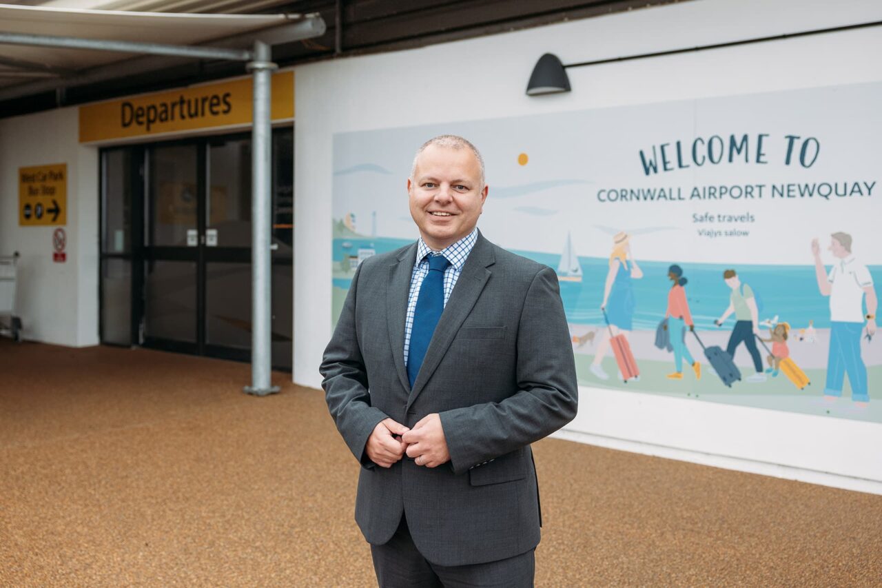 The Managing Director for Skybus outside terminal enterance for Cornwall Airport Newquay