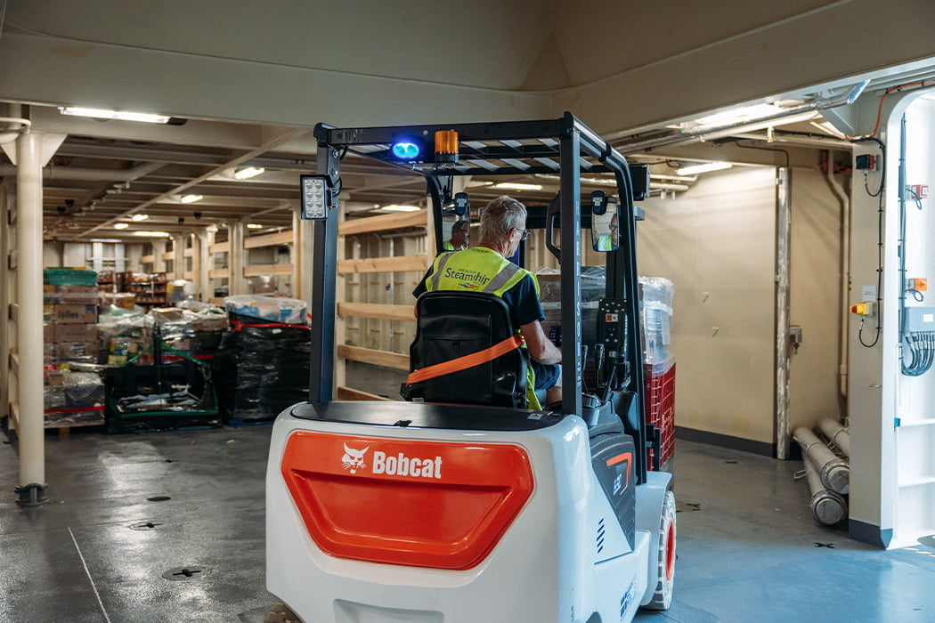 freight loading onto Menawethan with fork lift truck